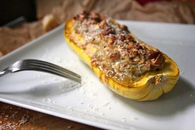 Roasted Delicata squash stuffed with nuts and cheese.