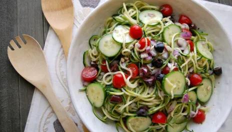 Greek Zoodle Salad, prepared and served in a dish