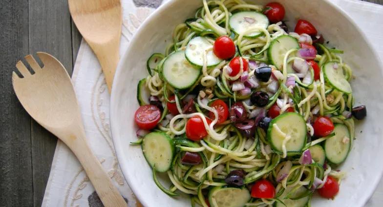 Greek Zoodle Salad, prepared and served in a dish